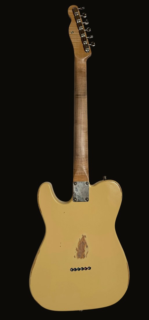 T-style in TV Yellow — back, flamed maple neck, vintage neck plate, string-through ferrules